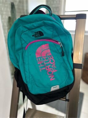 The North Face Teal Backpack with Pink Accents